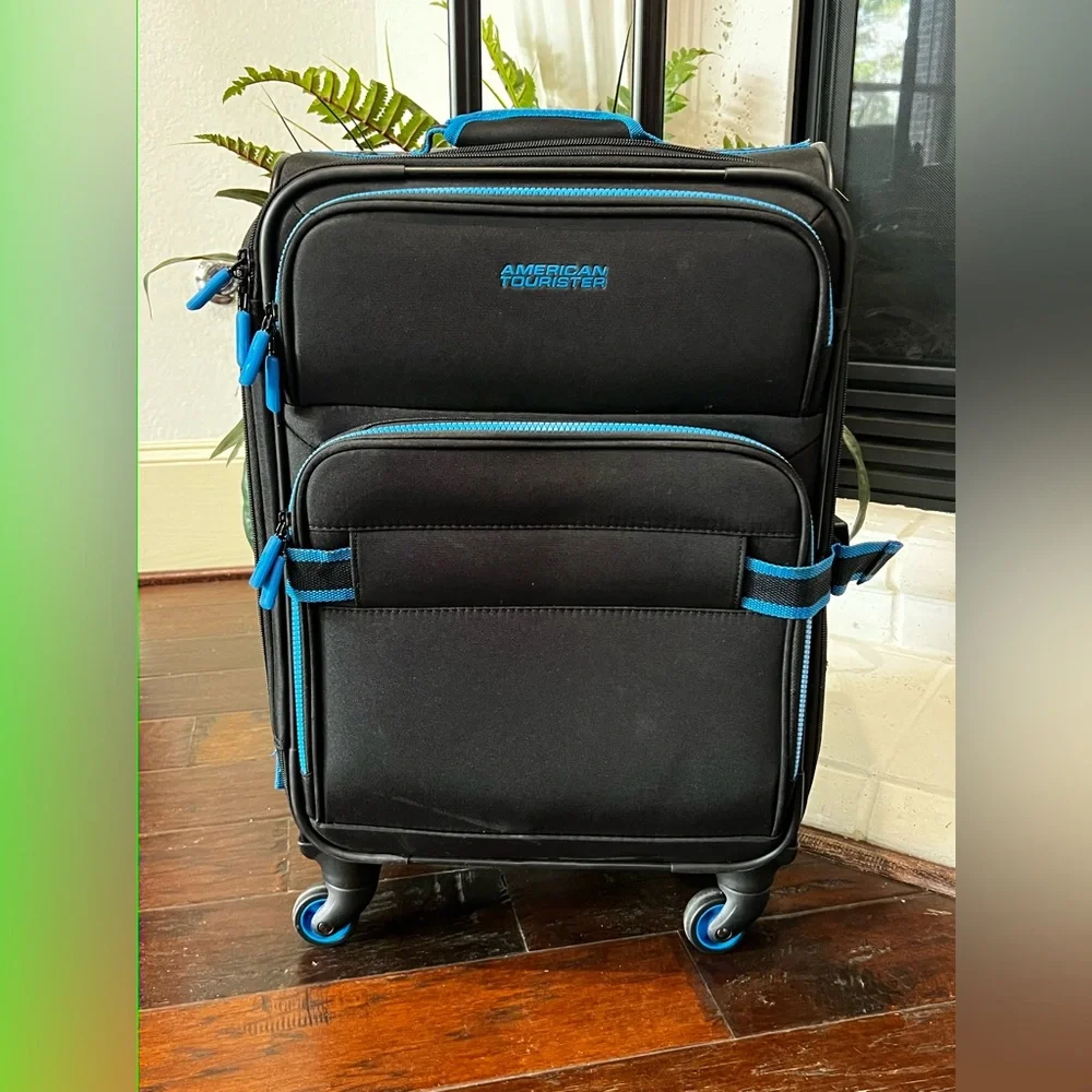 American Tourister Black and Blue Carry-On Spinner Suitcase